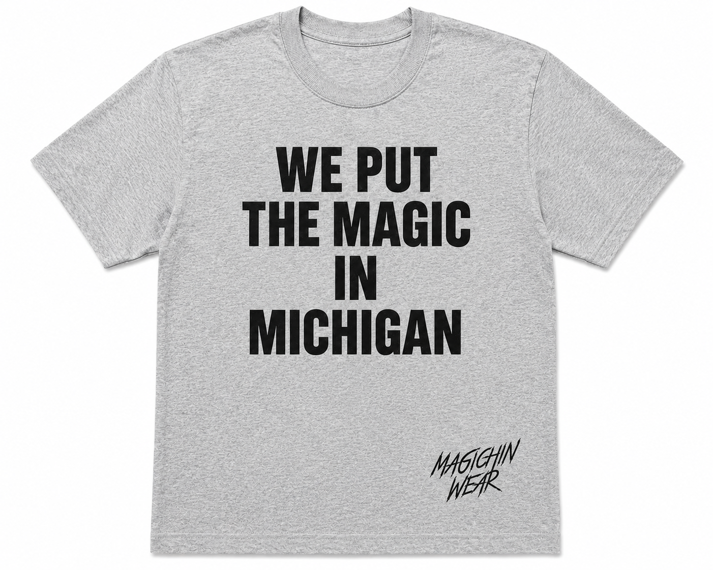 Gray t-shirt with 'WE PUT THE MAGIC IN MICHIGAN' text on a white background