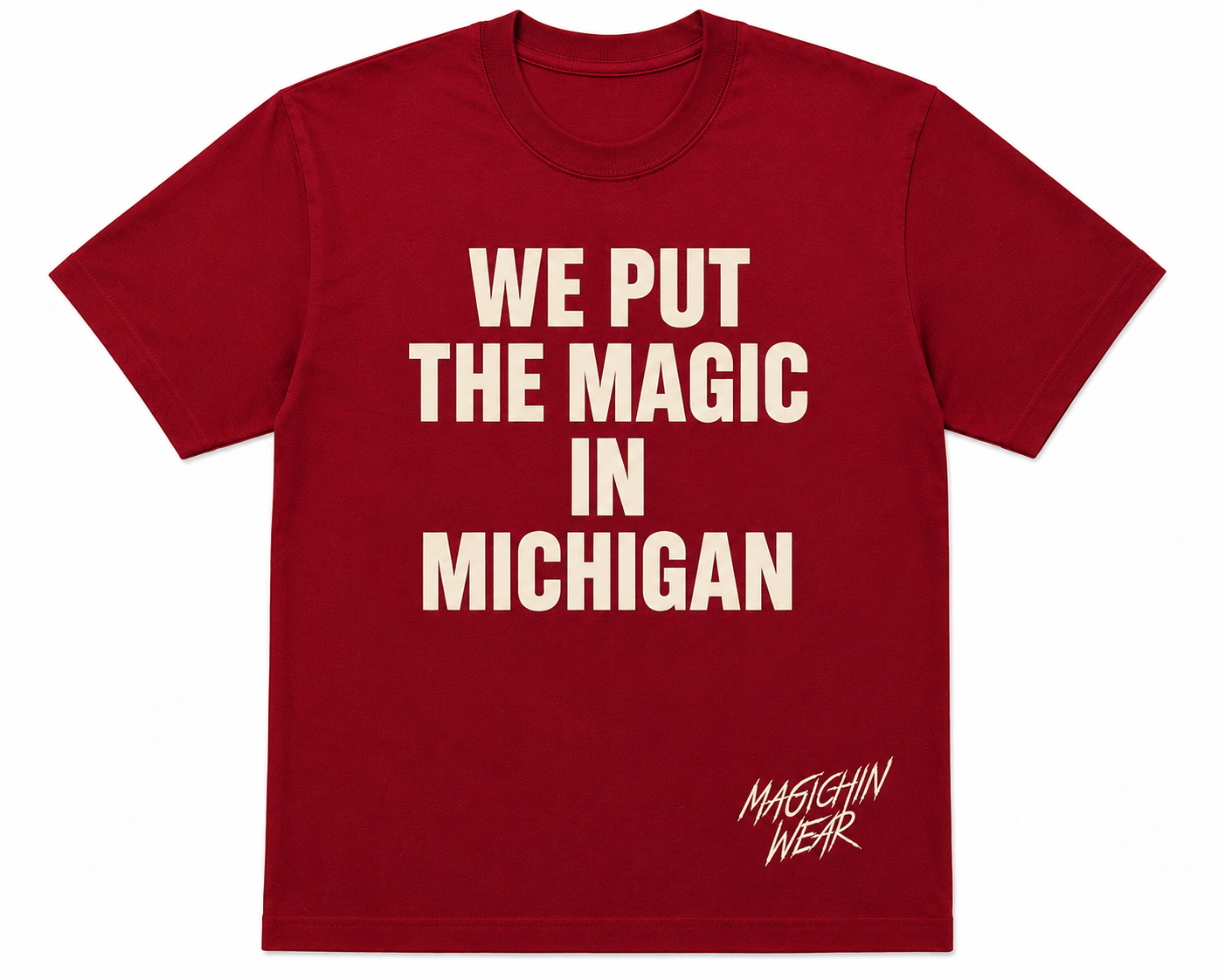 Red t-shirt with white text 'WE PUT THE MAGIC IN MICHIGAN' on a white background